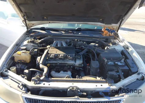 1999 Toyota Camry Solara Sle z USA, uszkodzony, nr VIN 2T1CF22P4XC160724